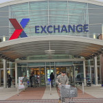 Ramstein Air Base unveils the new logo for the Army and Air Force Exchange (AAFES), Dec. 15, 2010. The new Exchange brand name and logo will begin appearing on the front of Army and Air Force Exchange (AAFES) stores starting at Tinker Air Force Base, and continuing through 2011. Additionally, the name and logo will be added to all marketing, advertising and collateral business materials, such as stationary, business cards, name tags, corporate presentations, tabloids, catalogs, shopping bags, exterior signs, tractor-trailer trucks, and publications like the Exchange Post, just to name a few. (U.S. Air Force photo by Airman 1st Class Desiree Whitney Esposito)